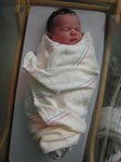 All swaddled and sleepy after the bath. Taken on August 20th, 2007