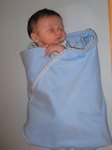 Trying out the crib at home. Taken on August 23rd, 2007