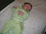 Geoffrey relaxes after a long jog in his track suit. Taken on August 26th, 2007