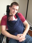 It's a hard life, holding a sleeping baby. Taken on September 22nd, 2007
